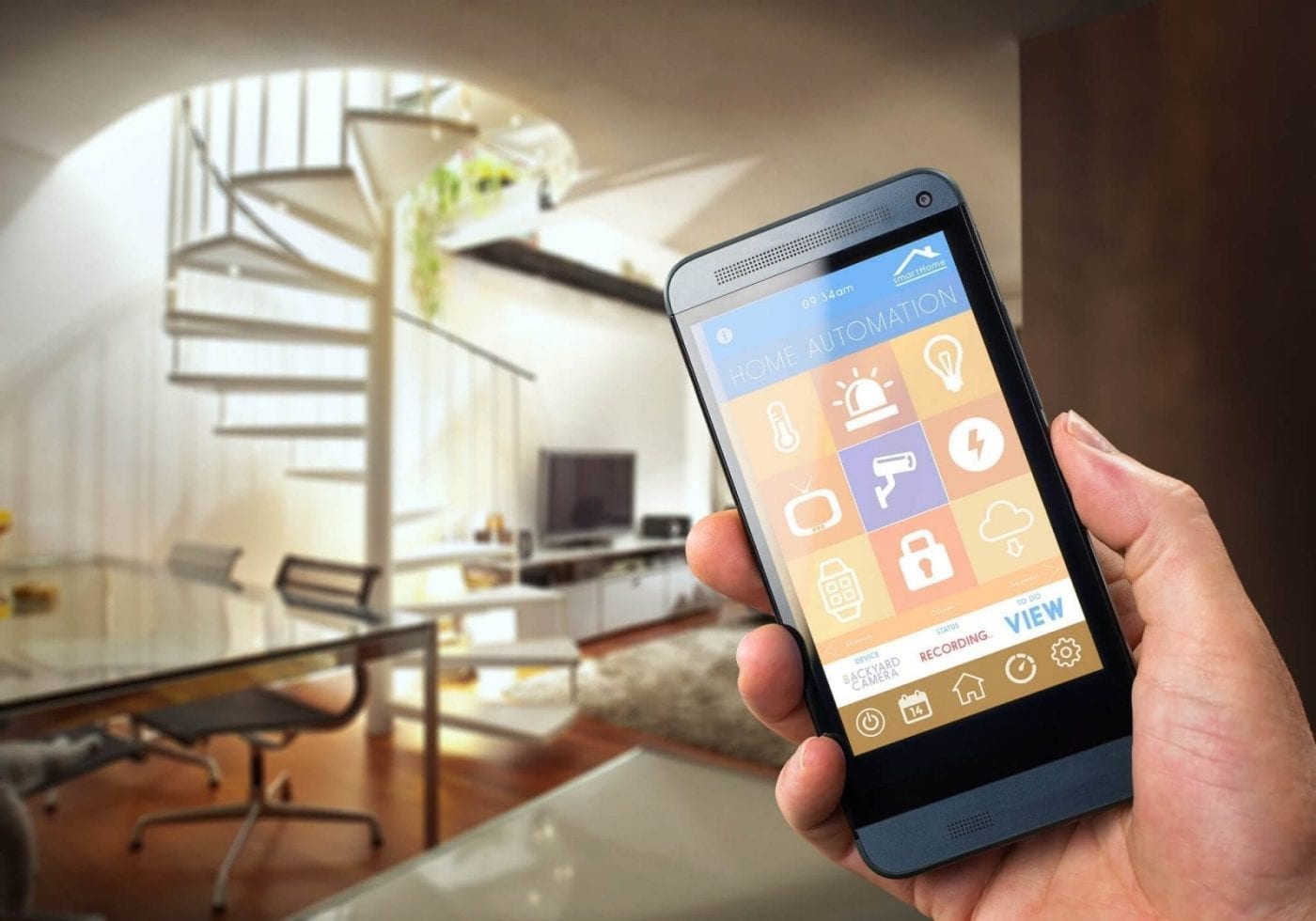 Smartphone in Hand With Opened Home Automation Application